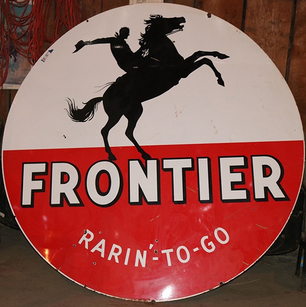 Frontier Gasoline "Rarin' to Go" porcelain gas station sign from the 1950s brings $5,375 at Holabird's seven-day auction